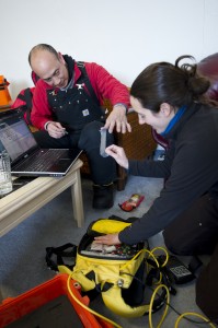 Ignatius Rigor and Melinda Webster prepare the equipment to go out in the field.  Chris Linder / Univ. of Washington