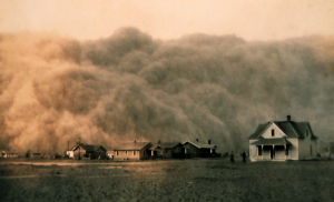 A dust storm engulfs Stratford, Texas in April of 1935. The drought of 1934 was likely made worse by dust storms triggered by the poor agricultural practices of the time. Credit: NOAA/George E. Marsh Album 